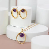 CONJUNTO EM AMETISTA COM DESIGN ELEGANTE DOURADO